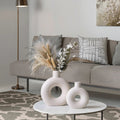Stylish White Hollow Donut Vase for Home Decor.
