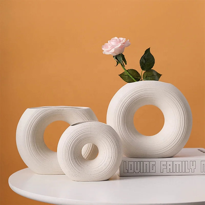 Stylish White Hollow Donut Vase for Home Decor.
